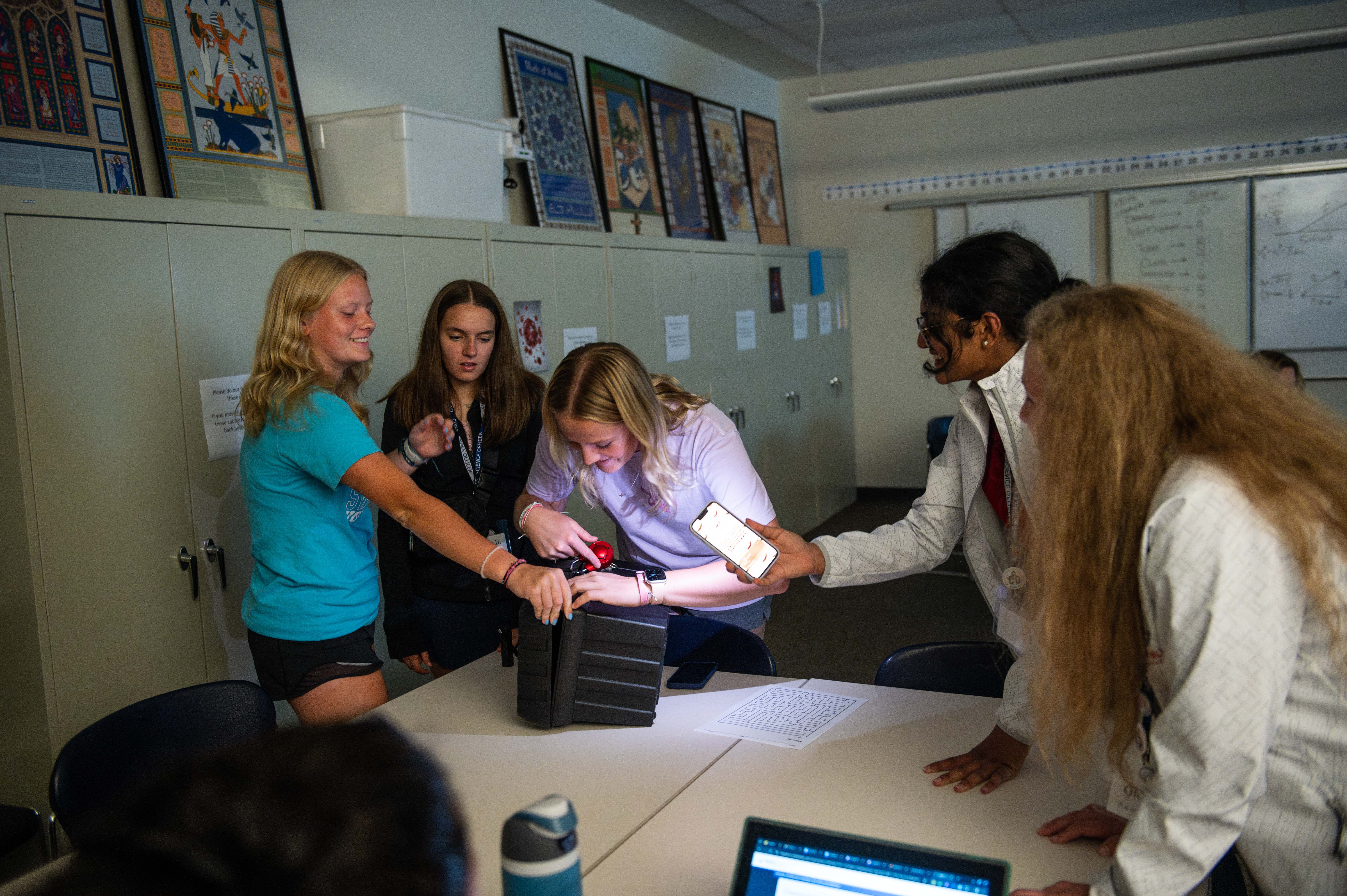 Students solving escape room